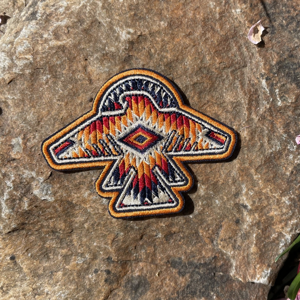 Native American designed buffalo patch in red and oragne