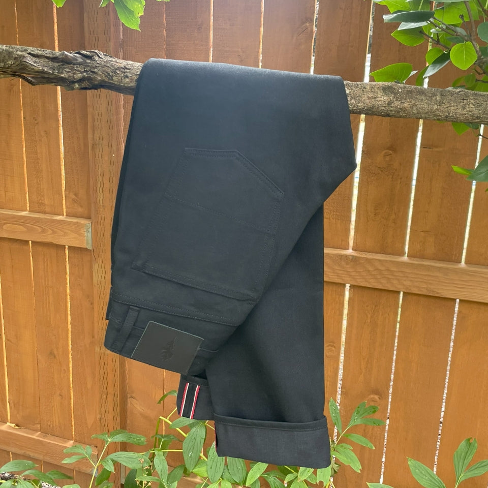 Black selvedge denim jeans made in USA with Native American Ginew Leather Patch 