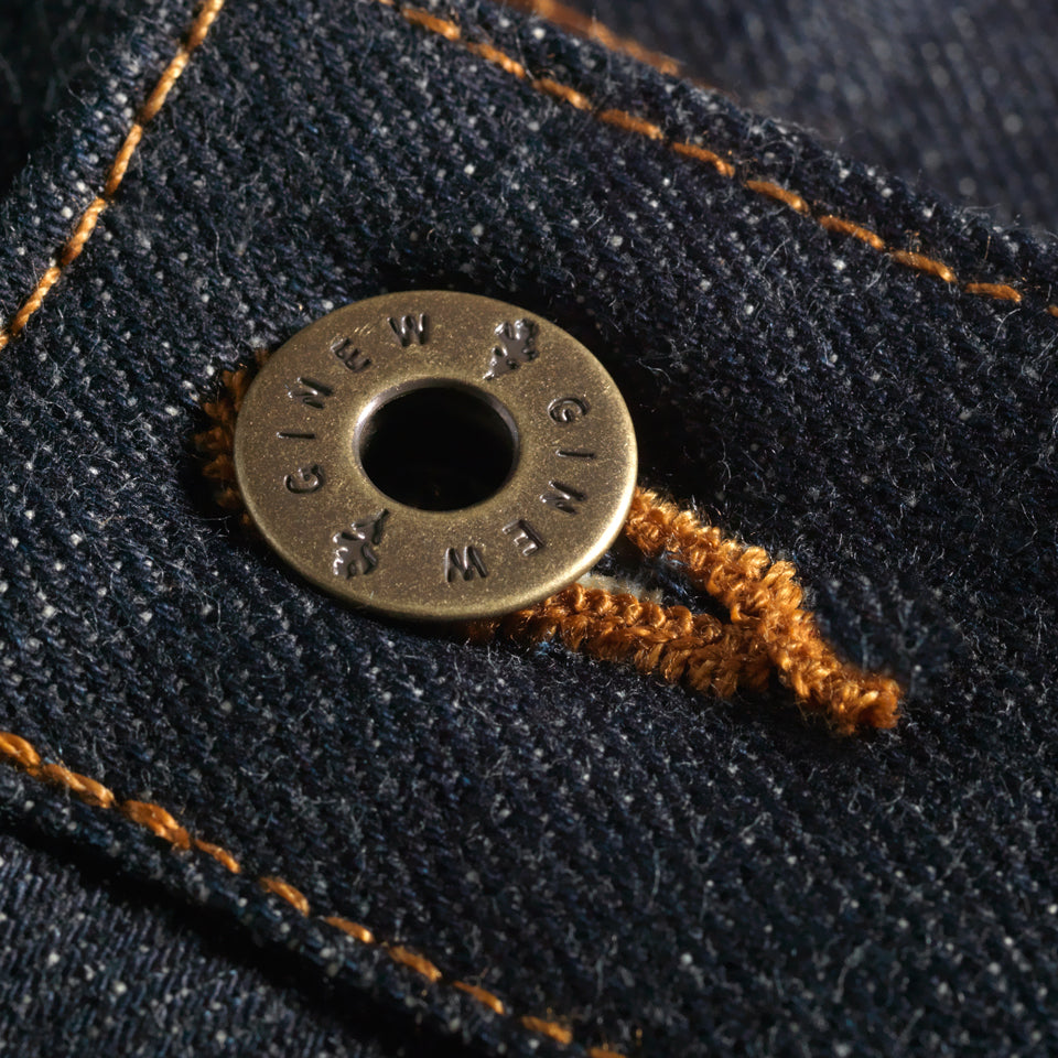 custom brass button on Indigo selvedge Japanese denim jeans made in USA by Native American 